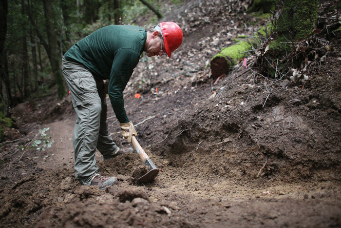 Volunteer Crew Leader Dan King buffing out a section of trail.