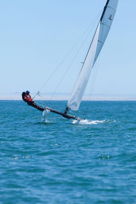 Skipper and crew suspended by a trapeze wire on a Hobie 20. Photo: Deborah Swanson
