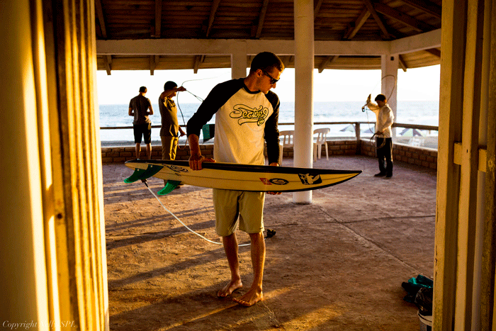 Kyle gearing up while his friends practice their lasso skills.  Photo: Nelly