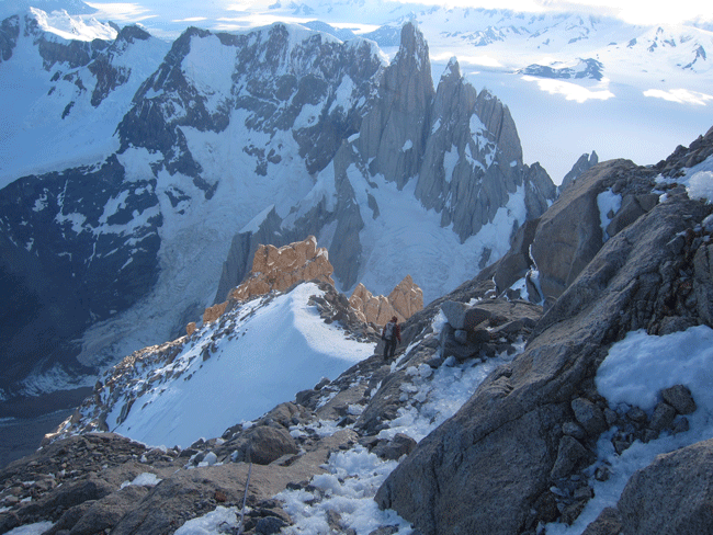 The Torre Group rising from the ice cap (Cerro Torre is the most prominent), as seen during a descent of neighboring Fitz Roy. (Kelly Cordes)
