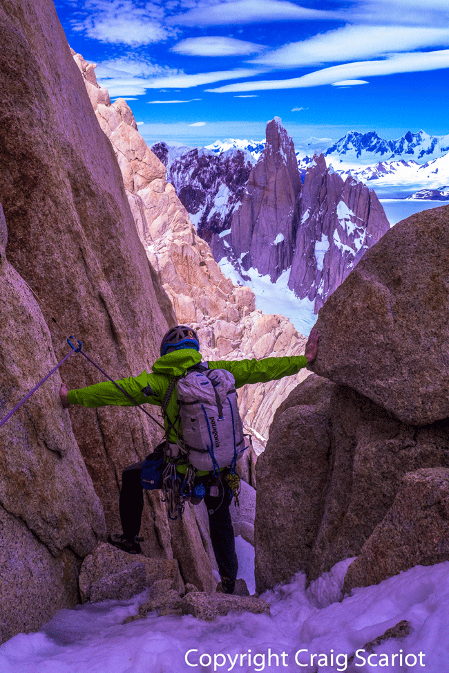 Kelly Cordes during an ascent of Fitz Roy in 2013, with Cerro Torre framed in the background. (Craig Scariot)