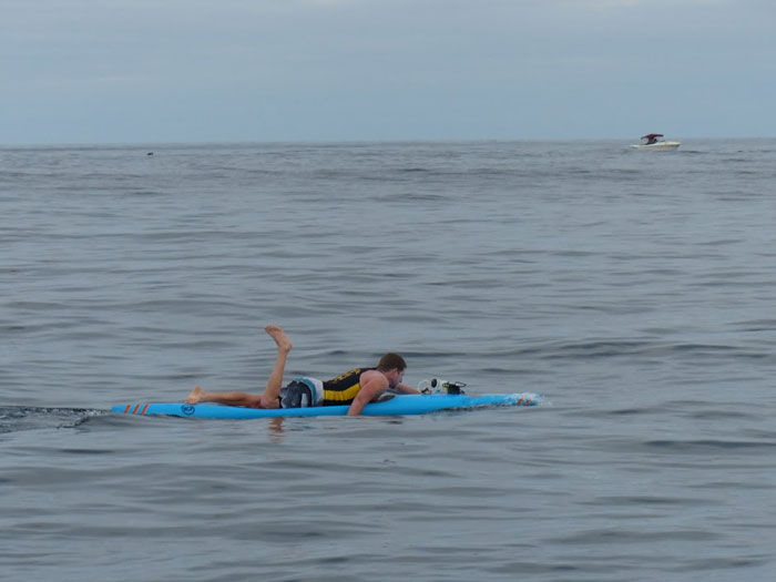 Ryan paddling in glassy mid-channel conditions during the 2014 Catalina Classic Paddleboard Race (Johnny Kessel).