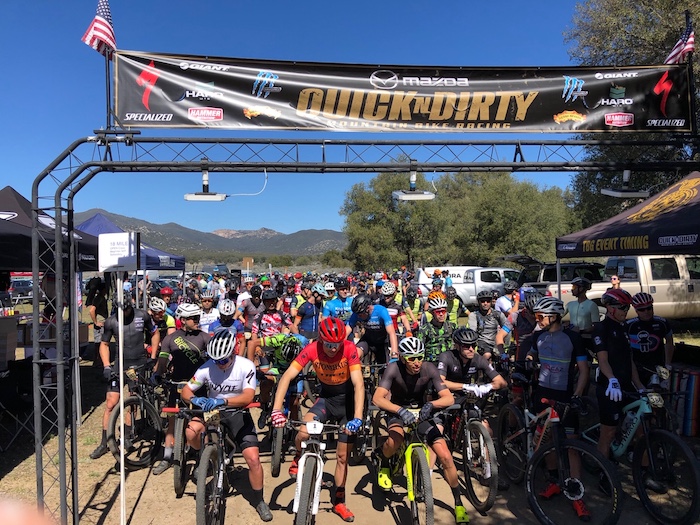 Cyclists line up at the start line for the Sagebrush Safari mountain bike race near Campo, California.