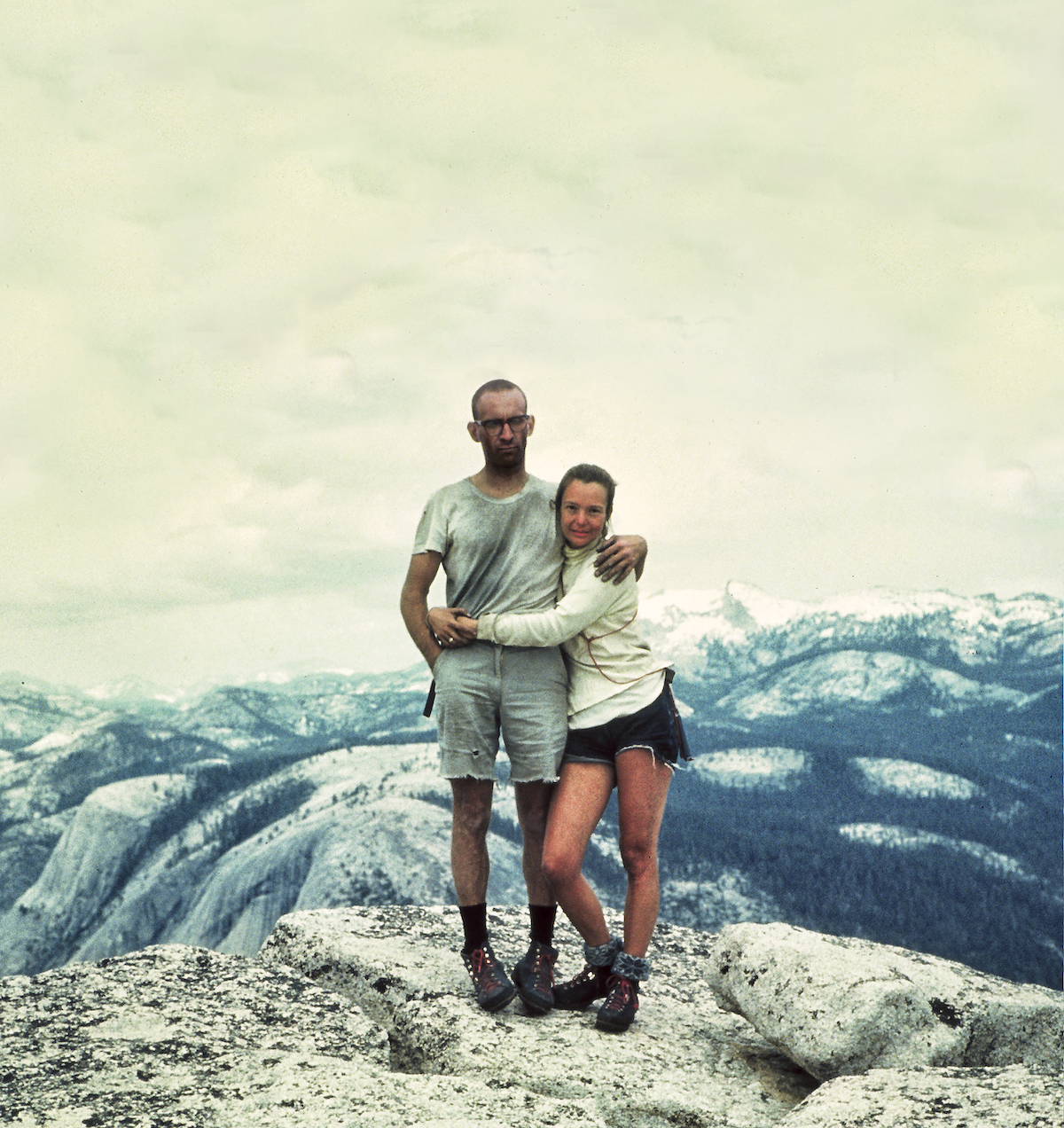 A portrait Royal and Liz Robbins at the top of a climb in Yosemite