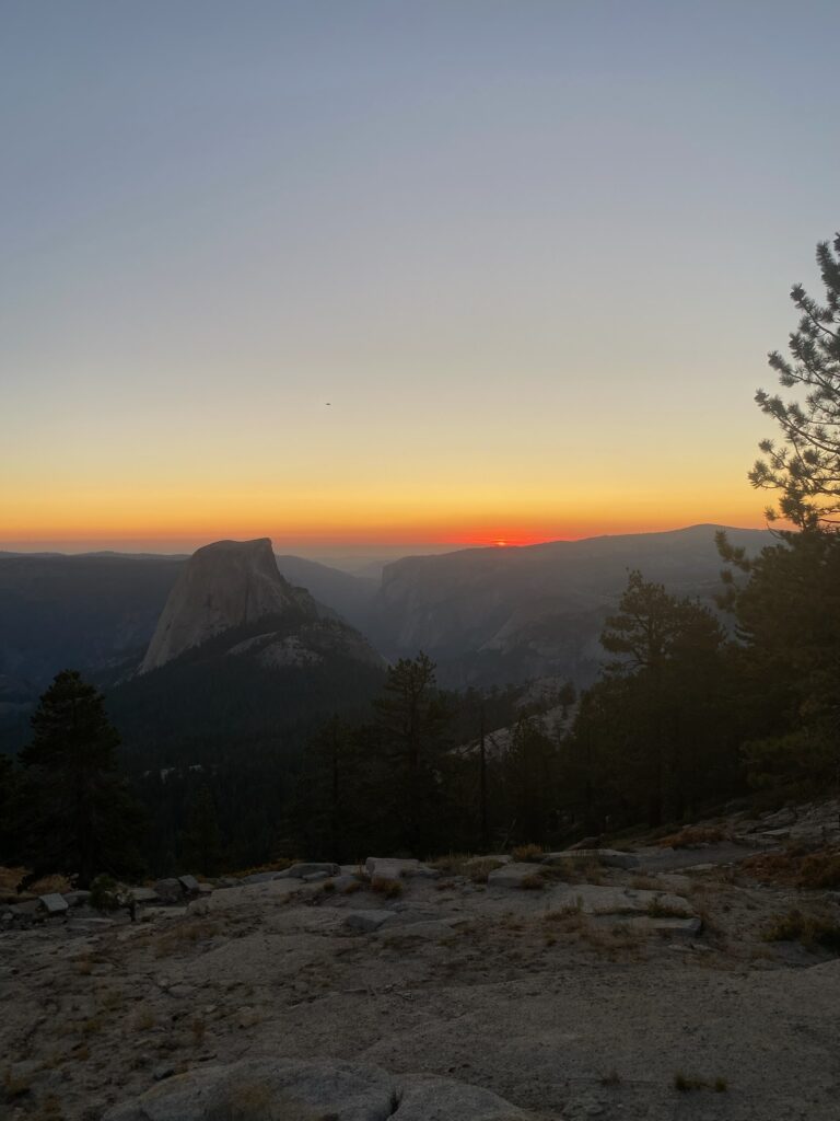 View of Half Dome from Clouds Rest at sunset.