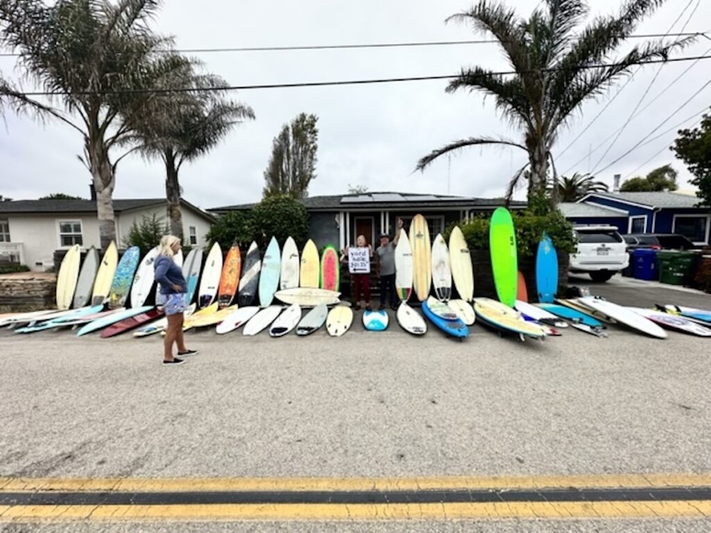 A lineup of boards for Maui board drive
